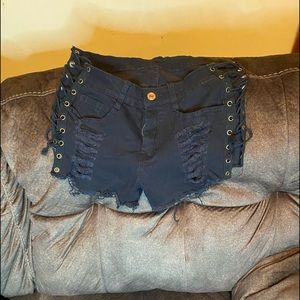 Ripped tie up shorts